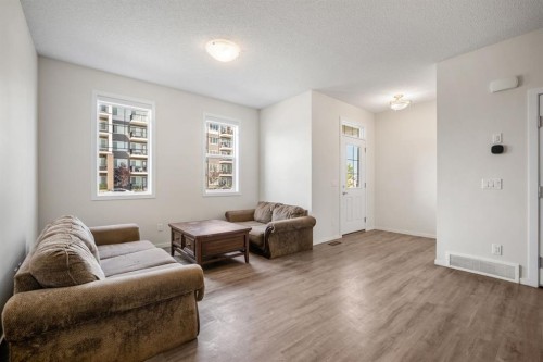 61 Cityline Gate Ne, Calgary, AB - Indoor Photo Showing Living Room