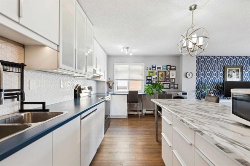 607-1320 12 Avenue Sw, Calgary, AB - Indoor Photo Showing Kitchen With Double Sink