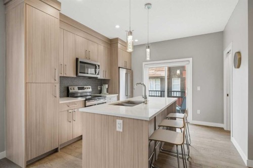 1932 26A Street Sw, Calgary, AB - Indoor Photo Showing Kitchen With Double Sink With Upgraded Kitchen