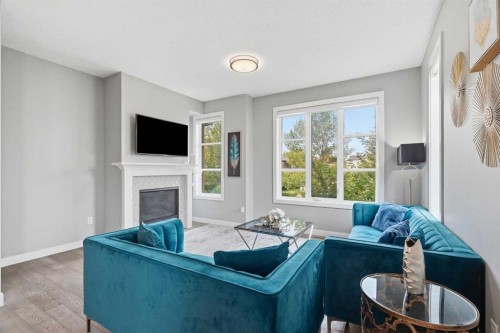 1932 26A Street Sw, Calgary, AB - Indoor Photo Showing Living Room With Fireplace