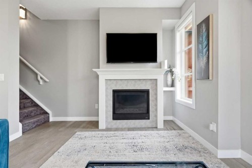 1932 26A Street Sw, Calgary, AB - Indoor Photo Showing Living Room With Fireplace