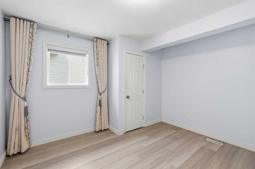 167 Harvest Glen Way Ne, Calgary, AB - Indoor Photo Showing Other Room