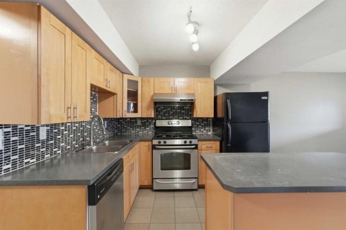 167 Harvest Glen Way Ne, Calgary, AB - Indoor Photo Showing Kitchen With Double Sink
