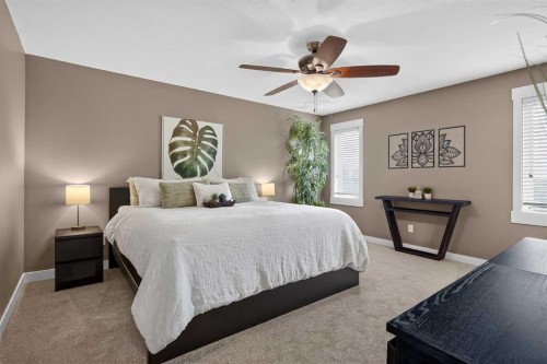 268 Rainbow Falls Green, Chestermere, AB - Indoor Photo Showing Bedroom