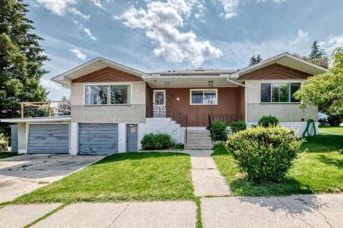 1735 38 Avenue Sw, Calgary, AB - Outdoor With Facade