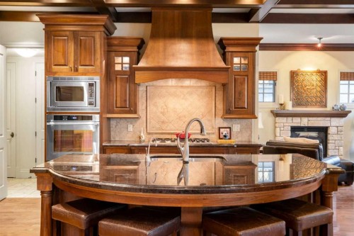 2905 Carleton Street Sw, Calgary, AB - Indoor Photo Showing Kitchen With Fireplace With Double Sink