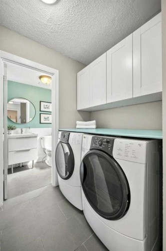 10411 Maplemont Road Se, Calgary, AB - Indoor Photo Showing Laundry Room