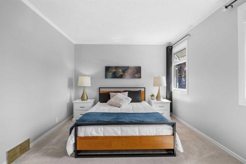 75 Woodhill Court Sw, Calgary, AB - Indoor Photo Showing Bedroom