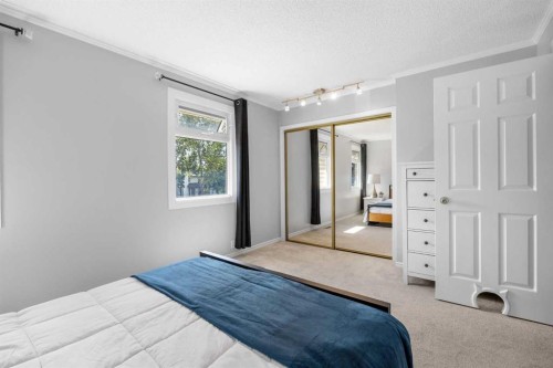 75 Woodhill Court Sw, Calgary, AB - Indoor Photo Showing Bedroom