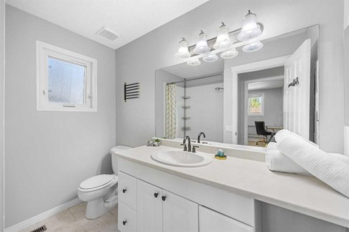 75 Woodhill Court Sw, Calgary, AB - Indoor Photo Showing Bathroom