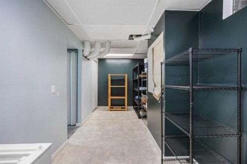 75 Woodhill Court Sw, Calgary, AB - Indoor Photo Showing Other Room