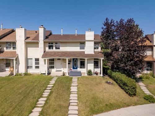 75 Woodhill Court Sw, Calgary, AB - Outdoor With Facade