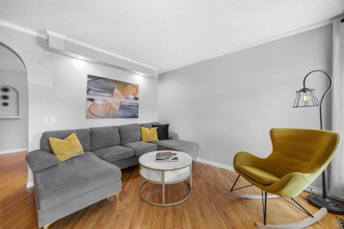 75 Woodhill Court Sw, Calgary, AB - Indoor Photo Showing Living Room