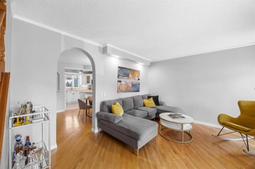 75 Woodhill Court Sw, Calgary, AB - Indoor Photo Showing Living Room