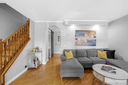 75 Woodhill Court Sw, Calgary, AB - Indoor Photo Showing Living Room