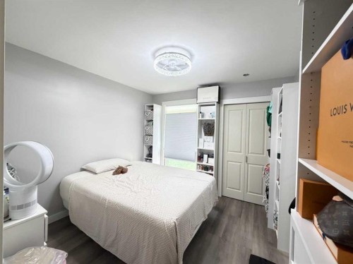 151 Sandstone Place Nw, Calgary, AB - Indoor Photo Showing Bedroom