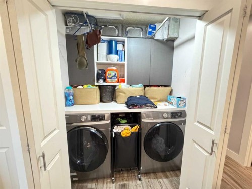 151 Sandstone Place Nw, Calgary, AB - Indoor Photo Showing Laundry Room