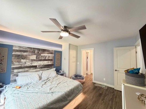 151 Sandstone Place Nw, Calgary, AB - Indoor Photo Showing Bedroom