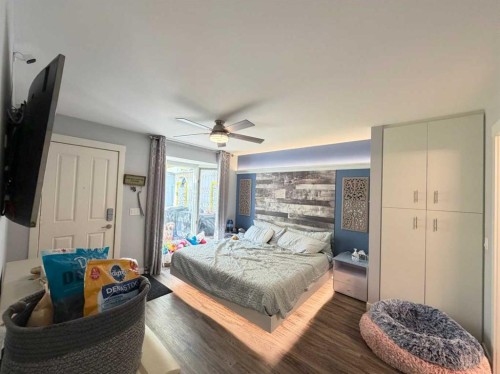 151 Sandstone Place Nw, Calgary, AB - Indoor Photo Showing Bedroom