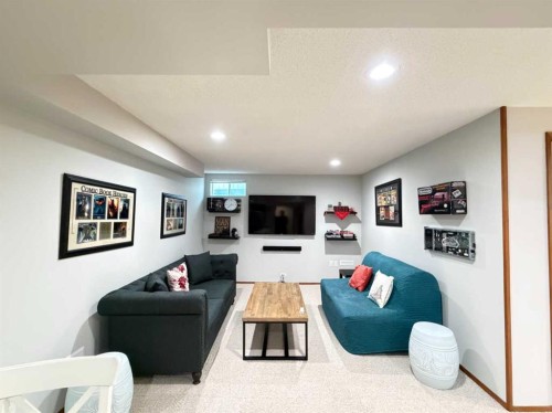 151 Sandstone Place Nw, Calgary, AB - Indoor Photo Showing Living Room