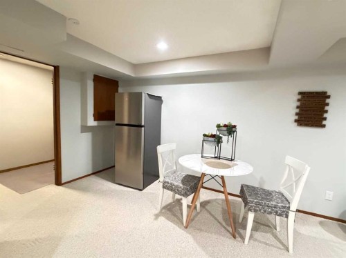 151 Sandstone Place Nw, Calgary, AB - Indoor Photo Showing Dining Room