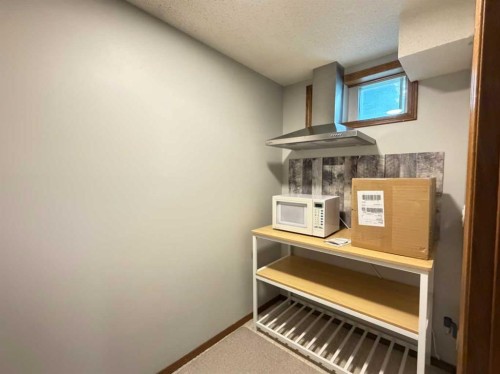 151 Sandstone Place Nw, Calgary, AB - Indoor Photo Showing Other Room