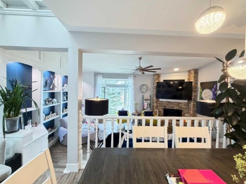 151 Sandstone Place Nw, Calgary, AB - Indoor With Fireplace