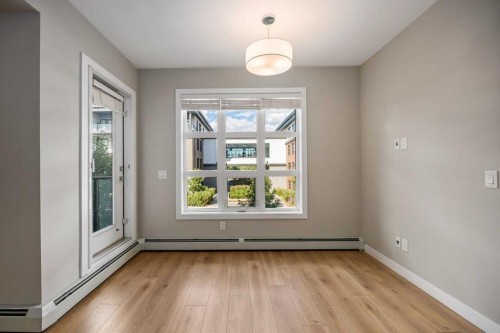 203-383 Smith Street Nw, Calgary, AB - Indoor Photo Showing Other Room