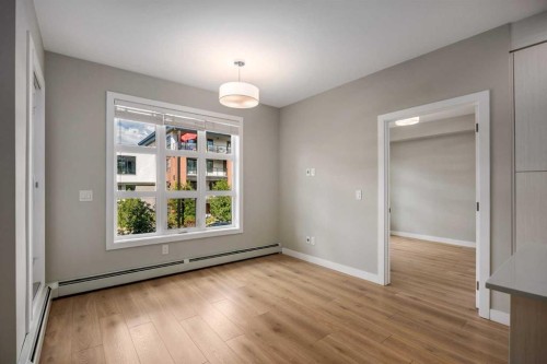 203-383 Smith Street Nw, Calgary, AB - Indoor Photo Showing Other Room