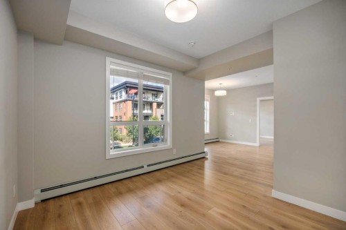 203-383 Smith Street Nw, Calgary, AB - Indoor Photo Showing Other Room
