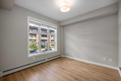 203-383 Smith Street Nw, Calgary, AB - Indoor Photo Showing Other Room