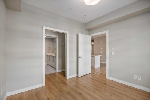 203-383 Smith Street Nw, Calgary, AB - Indoor Photo Showing Other Room