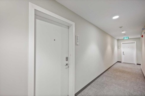 203-383 Smith Street Nw, Calgary, AB - Indoor Photo Showing Other Room