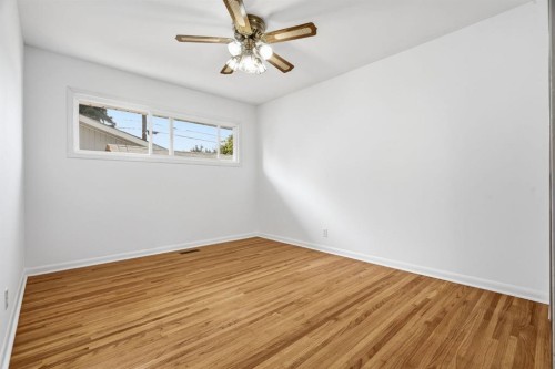 100 Westminster Drive Sw, Calgary, AB - Indoor Photo Showing Other Room