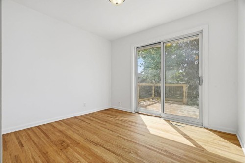 100 Westminster Drive Sw, Calgary, AB - Indoor Photo Showing Other Room