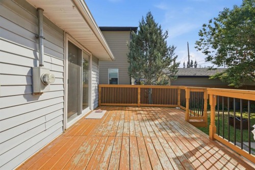100 Westminster Drive Sw, Calgary, AB - Outdoor With Deck Patio Veranda With Exterior