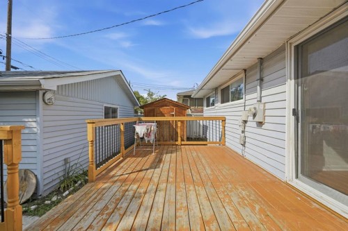 100 Westminster Drive Sw, Calgary, AB - Outdoor With Deck Patio Veranda With Exterior