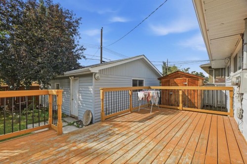 100 Westminster Drive Sw, Calgary, AB - Outdoor With Deck Patio Veranda With Exterior