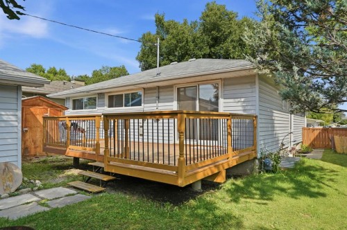 100 Westminster Drive Sw, Calgary, AB - Outdoor With Deck Patio Veranda With Exterior