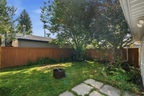 100 Westminster Drive Sw, Calgary, AB - Outdoor With Backyard