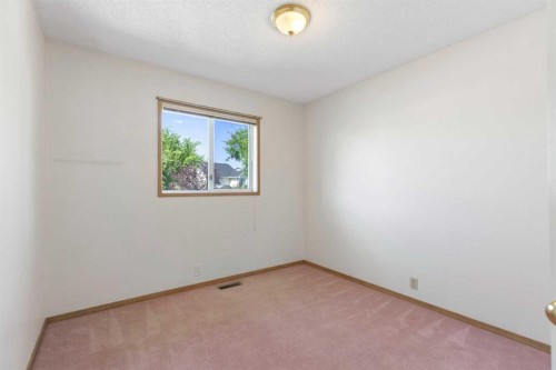 90 Martinridge Crescent Ne, Calgary, AB - Indoor Photo Showing Other Room