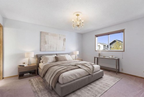 90 Martinridge Crescent Ne, Calgary, AB - Indoor Photo Showing Bedroom