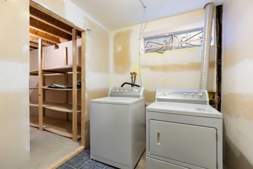90 Martinridge Crescent Ne, Calgary, AB - Indoor Photo Showing Laundry Room