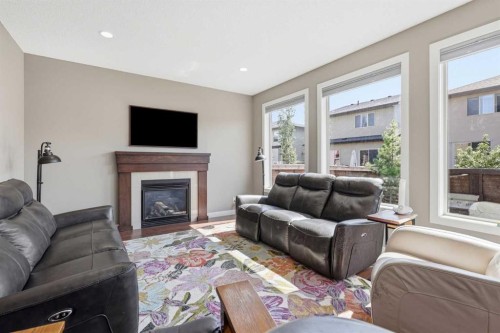 125 Walden Rise Se, Calgary, AB - Indoor Photo Showing Living Room With Fireplace
