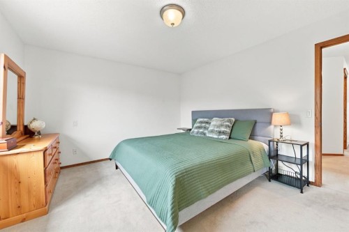 32 Tuscany Ravine Crescent Nw, Calgary, AB - Indoor Photo Showing Bedroom