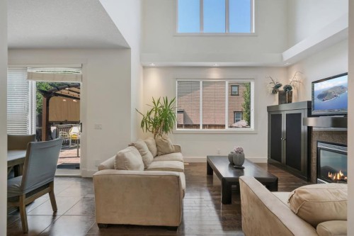 242 Valley Woods Place Nw, Calgary, AB - Indoor Photo Showing Living Room With Fireplace