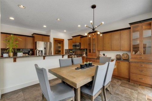 242 Valley Woods Place Nw, Calgary, AB - Indoor Photo Showing Dining Room