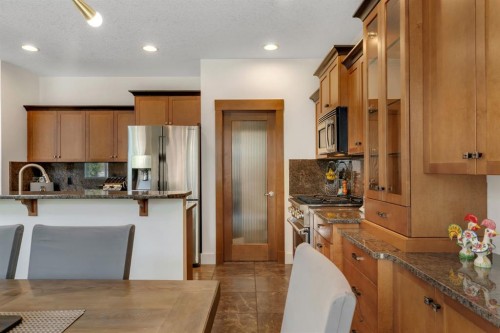 242 Valley Woods Place Nw, Calgary, AB - Indoor Photo Showing Kitchen