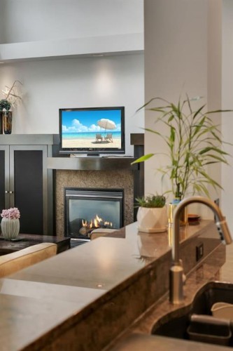 242 Valley Woods Place Nw, Calgary, AB - Indoor With Fireplace
