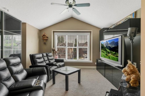 242 Valley Woods Place Nw, Calgary, AB - Indoor Photo Showing Living Room